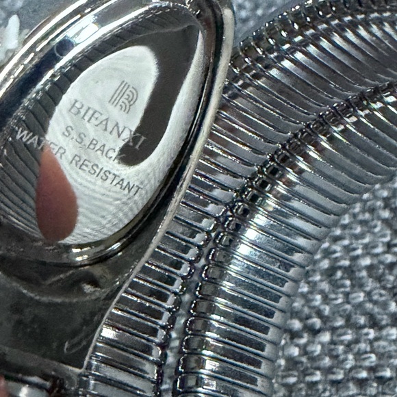 Silver Coiled Bracelet Watch
